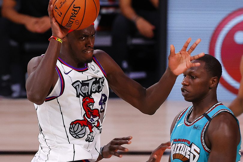 Aug 9, 2020; Lake Buena Vista, Florida, USA; Pascal Siakam #43 of the Toronto Raptors is charged with an offensive foul against Gorgui Dieng #14 of the Memphis Grizzlies during the second quarter at Visa Athletic Center at ESPN Wide World Of Sports Complex. Mandatory Credit: Kevin C. Cox/Pool Photo-USA TODAY Sports