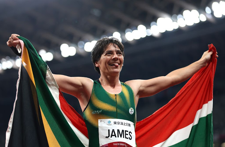 TOKYO, JAPAN - AUGUST 31: Sheryl James of South Africa celebrates winning bronze in the Women's 400m T37 final on day 7 of the Tokyo 2020 Paralympic Games at Olympic Stadium on August 31, 2021 in Tokyo, Japan. (Photo by Alex Pantling/Getty Images)
